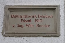 Dörzbach, Inschrifttafel am Elektrizitätswerk.